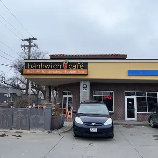 cars parked in front of the building
