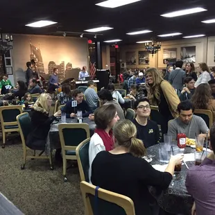 a large group of people eating
