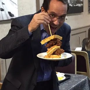 a man eating a sandwich