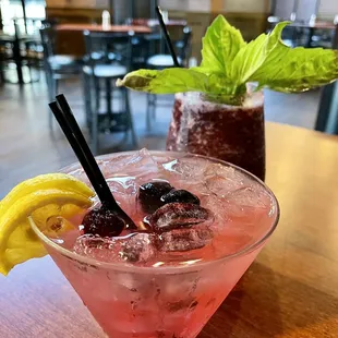 two cocktails on a table