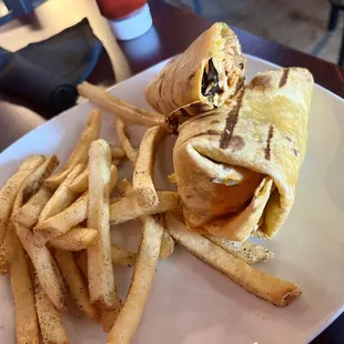 Buffalo chicken wrap and French fries