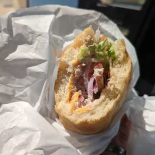 Tuna grinder with the works and cheddar.