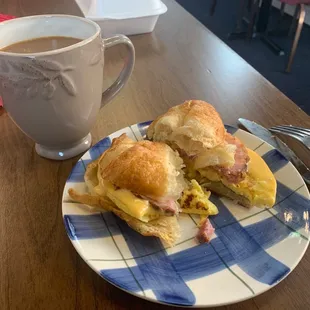 Coffee with a ham egg and cheese croissant