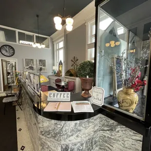 Seating area where the bank tellers used to stand.