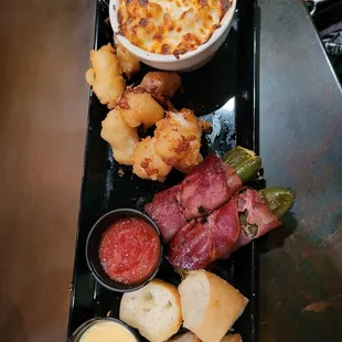 Very delicious sampler,  mac and cheese, bacon wrapped jalapeno , cheese curds