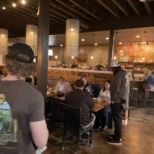 a group of people sitting at tables