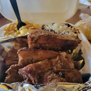 Pork Ribs dinner (five pieces with macaroni and cheese and red beans &amp; rice.)