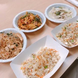 four plates of food on a table