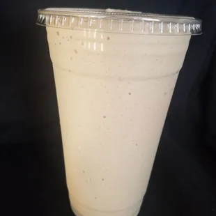 a smoothie in a plastic cup