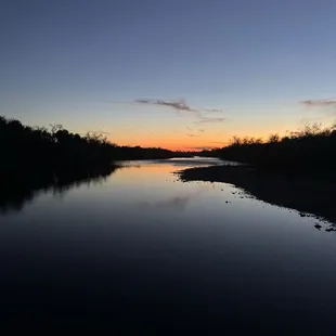 The river at Bannister Park at twilight.