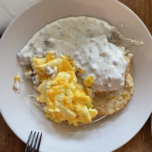 Biscuit &amp; gravy with cheesy eggs.