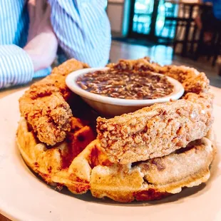 Chicken and waffles with bourbon pecan maple syrup