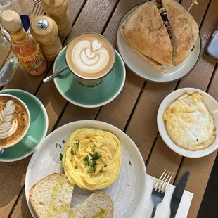 Two Eggs any style, Cappuccino, Mocha and Bacon Egg Roll