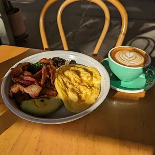 Golden folded eggs and a latte