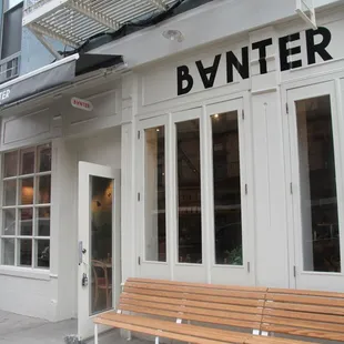 a bench in front of a building