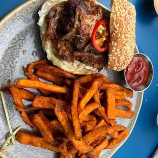 Pulled pork sandwich with sweet fries [perfectly cooked and seasoned] $16 was super tender and yummy