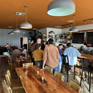 a large group of people at a wine tasting
