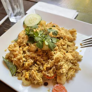 a plate of rice and vegetables