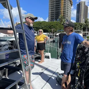 Devin and our dive group ready to leave the harbor