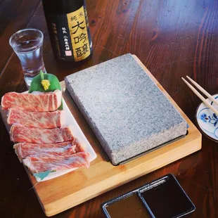 A5 Wagyu Beef seared on a hot lava rock.