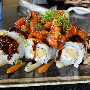 a close up of a plate of sushi
