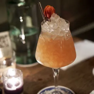 a cocktail in a glass on a table