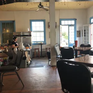 a man sitting at a table in a restaurant