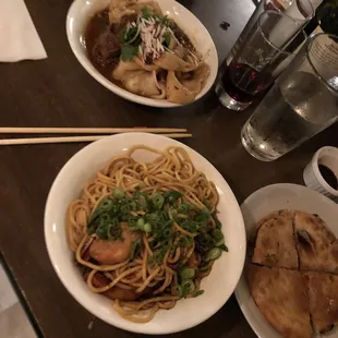 Hand pulled noodles in back, spicy shrimp noodles in front, scallion pancake to the right!