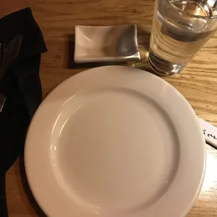 Empty plate after an hour of waiting and being told our food would be ready in 2-3 minutes multiple times. Pathetic.