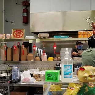 View looking into the kitchen from the ordering counter