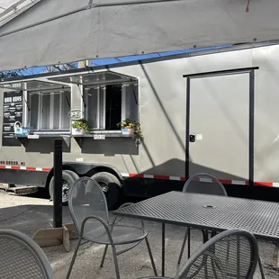 a food truck parked in a parking lot