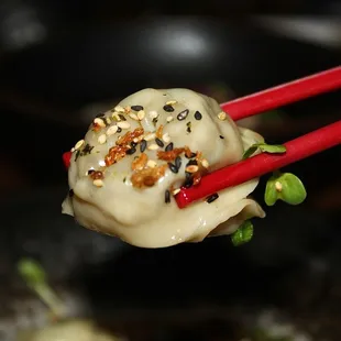 The Ev-ery Thing Mushroom Dumplings are made with shiitake mushrooms, garlic, scallions, sesame seeds, &amp; mushroom dashi sauce