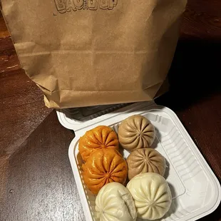 6 bao deal To go: 2 chicken, 2 pork, and 2 Spicy Brisket  $11 and something.