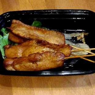 Chicken Teriyaki sticks from BAO Chinese Restaurant. They were a little bit greasy. You can see all the oil on the bottom of the container.