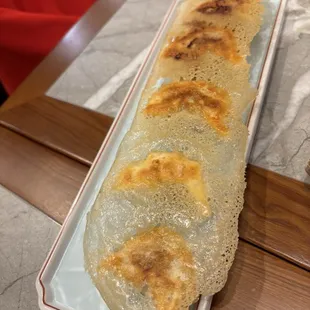 Beef and kimchi pan fried dumplings