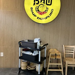 Random cleaning cart just left in dining area