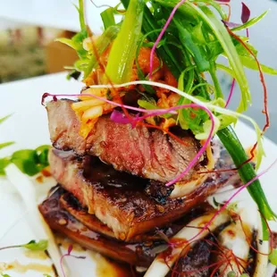 Dry smoked pipikaula style short ribs,sweet soy glaze,black salt,kimchi,pepper strands,micro greens,green onion silvers,sweet onoins