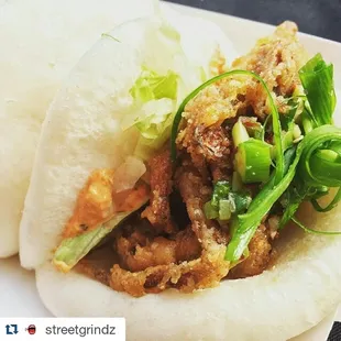Butter milk fried chicken BAO: housemade ranch dill paprika ,lettuce slaw,spicy pickle