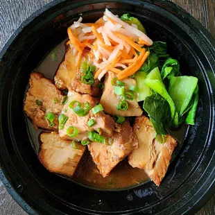 Pork belly adobo with bok choy and atchara.