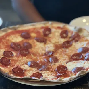 Pizza with spicy salami