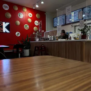 a view of a restaurant counter