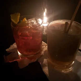 two cocktails on a table