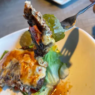 Bloody Mary burger, being consumed.