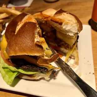 a burger and fries on a plate
