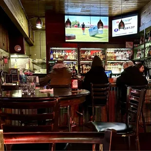 Full bar as you walk in with lots of TVs around