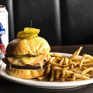 a burger and french fries on a plate