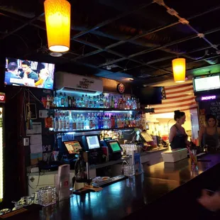 bar counter and televisions