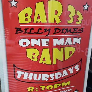 one man band sign in window