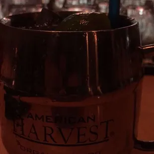 a shot of a drink in a metal mug