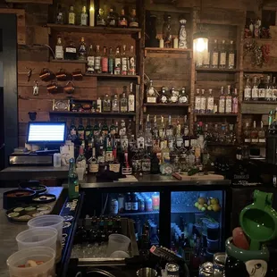 a bar with lots of liquor